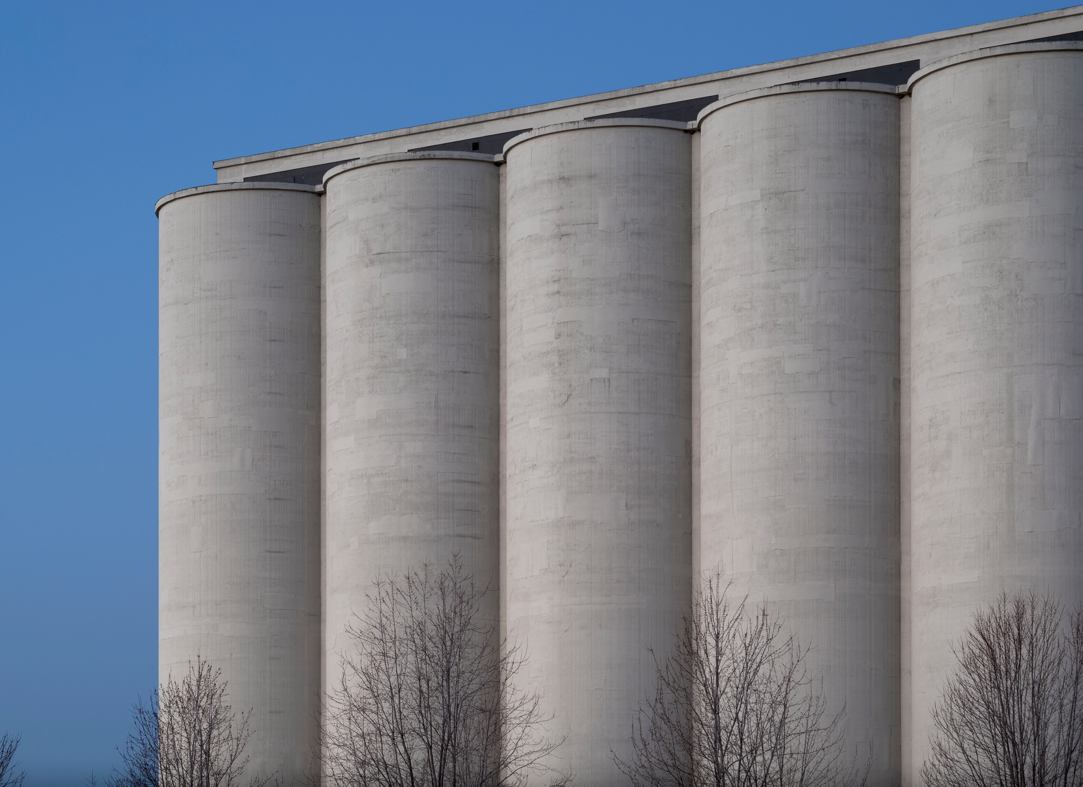 Close up shot of the silos at the Canada Malting Silo, a concrete industrial building along Toronto's Waterfront.