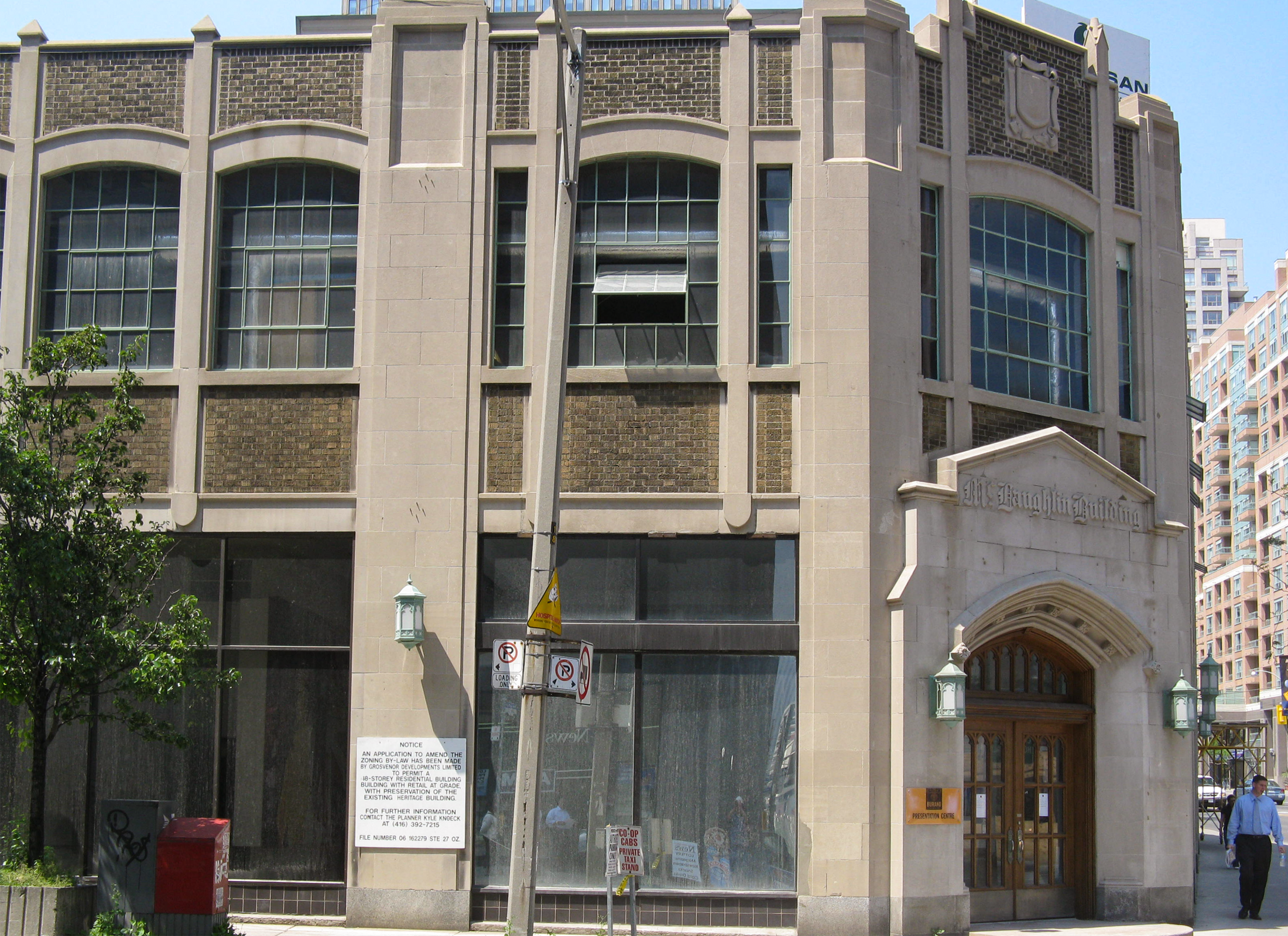 Two-storey neo-gothic brick building.