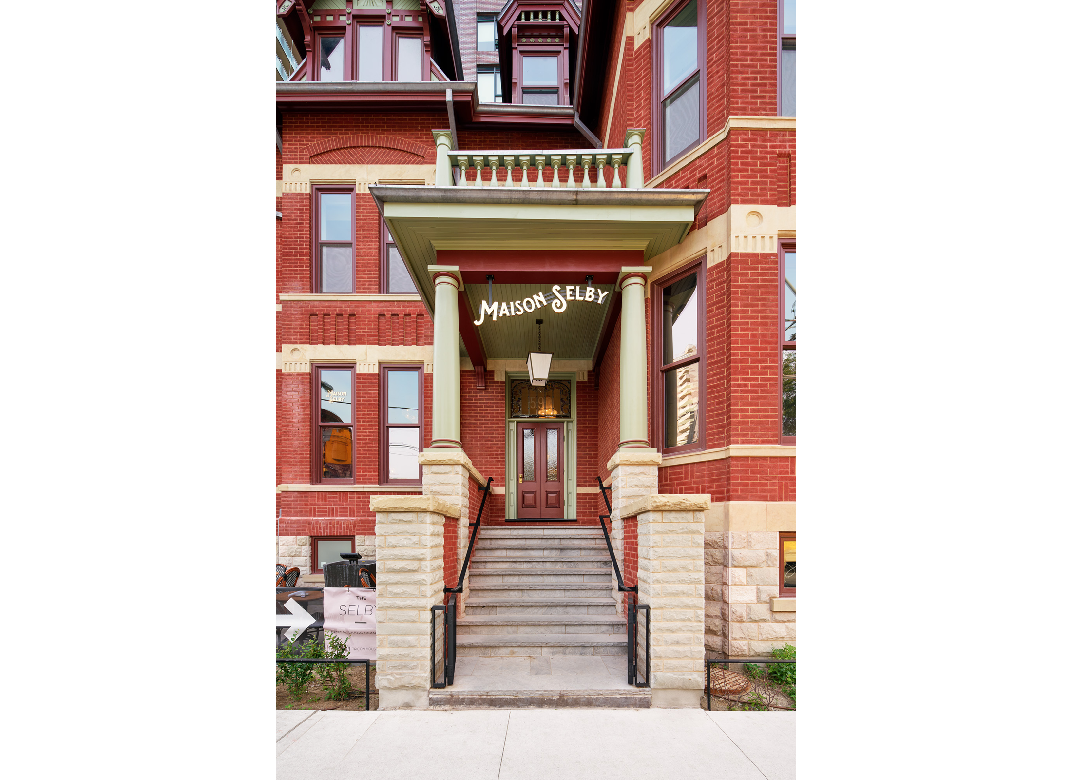 Entryway of Maison Selby, a historic red brick home