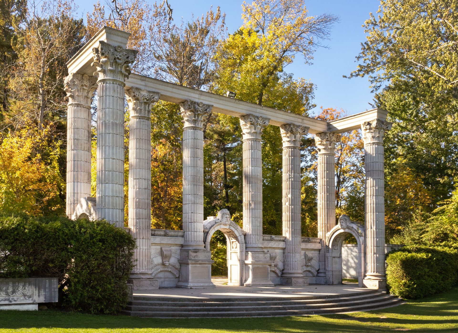 Classical colonnade set within a garden.