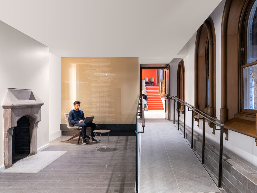 Interior of University College showing an accessible ramp hallway between levels.