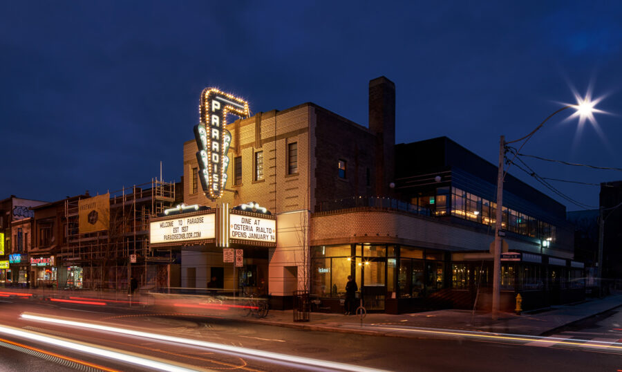 Paradise Theatre at night, marquee sign on.