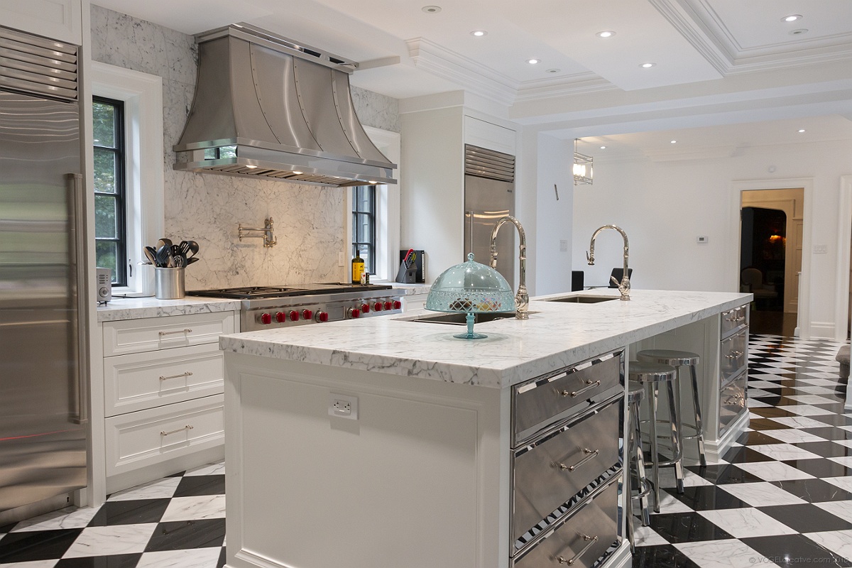 photo showing a large marble kitchen island