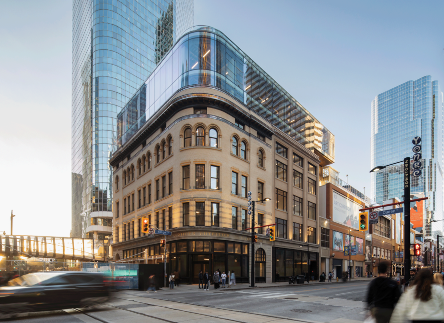 2 Queen Street West Facade with glass addition on top of building.