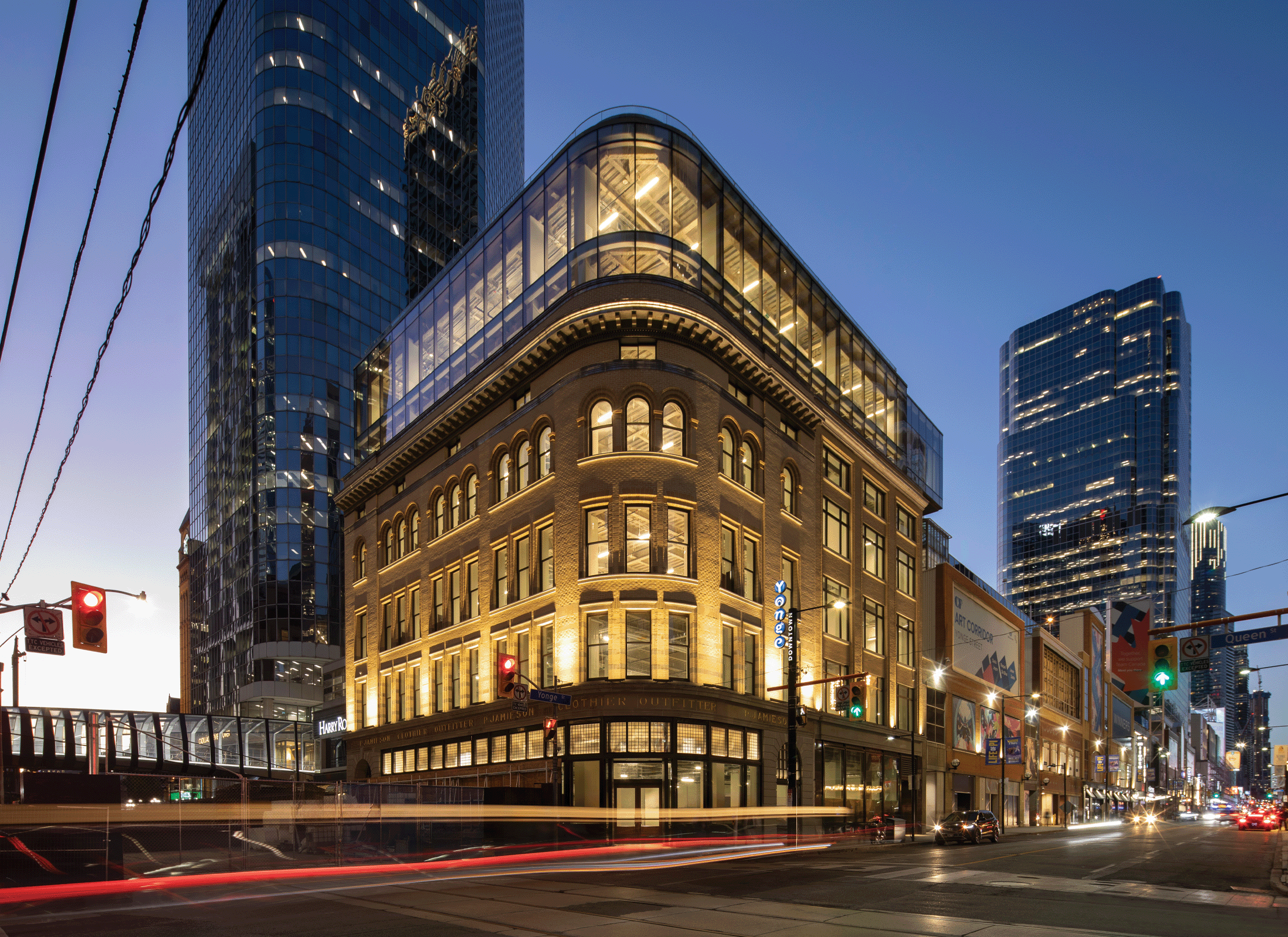 2 Queen Street West Facade with glass addition on top of building.
