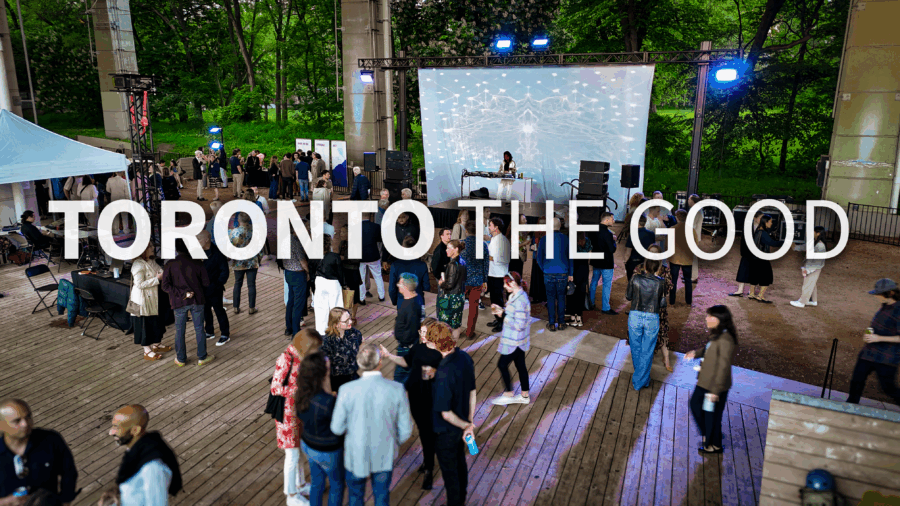 The words Toronto the Good overlayed on top of a groups of people standing around at an outdoor party with a screen and dj in the background