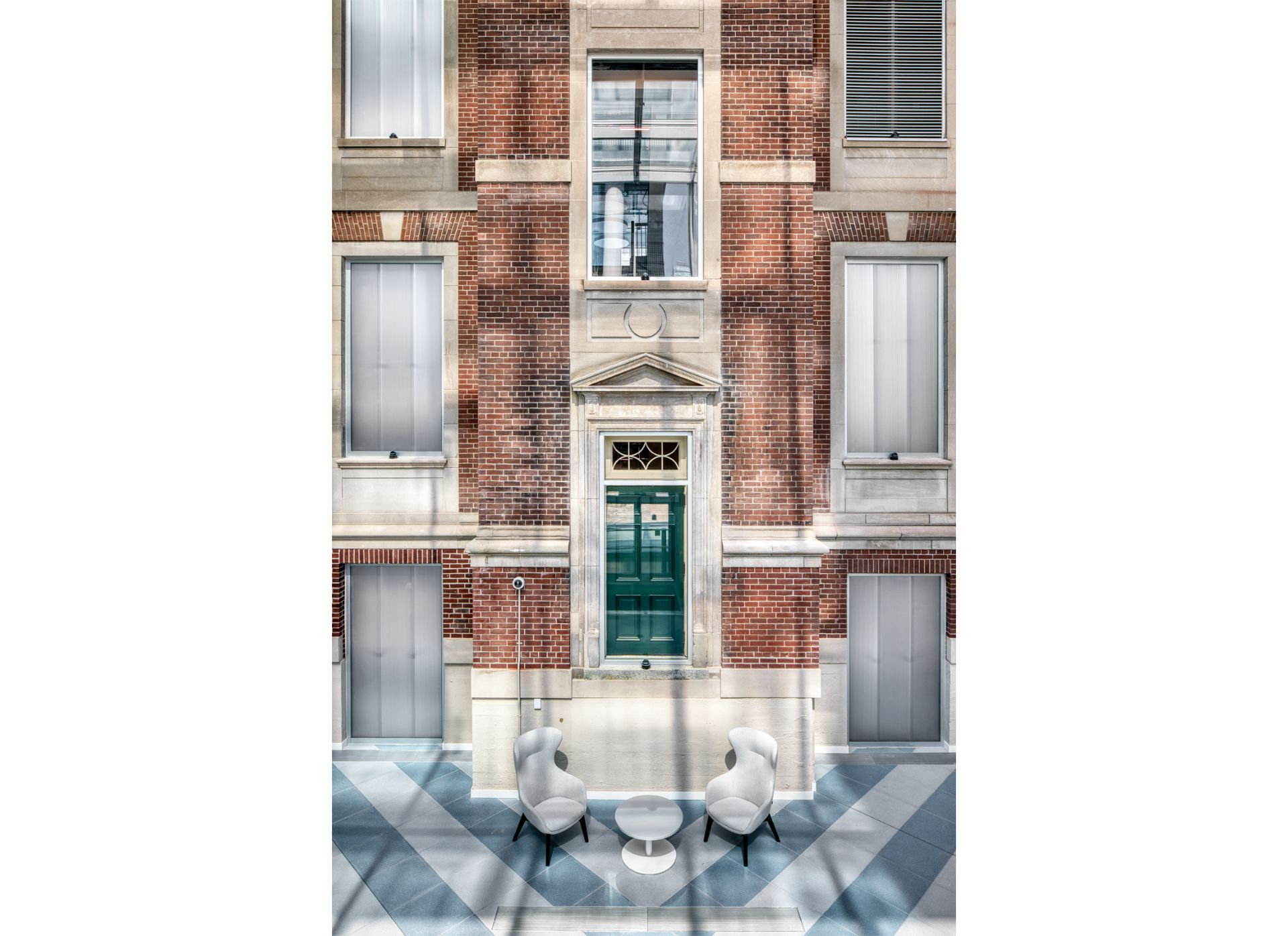 Interior area of the Fitzgerald building, a three storey Georgian Revival building made of red brick with glass extension.