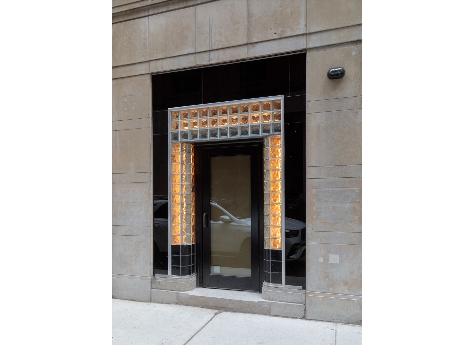 Glass block and stone facade.