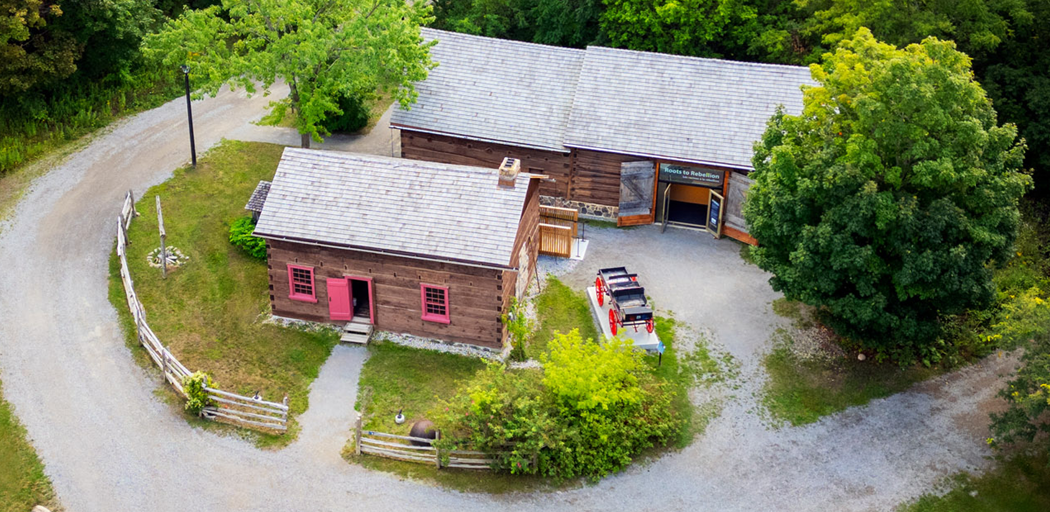 Aerial image of the Pickering Museum Village, a cluster of heritage buildings made from timber construction.
